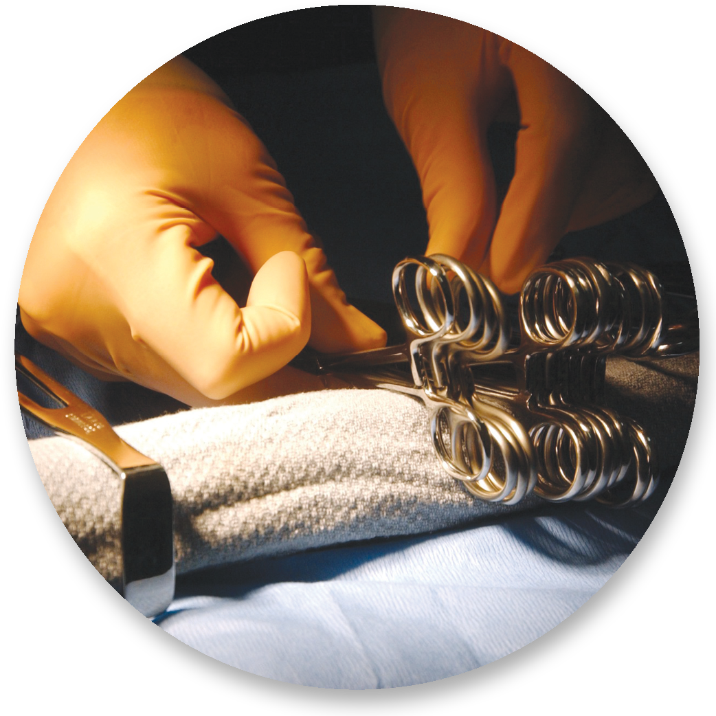 hands with surgical tools