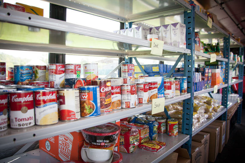 canned goods on food bus shelf