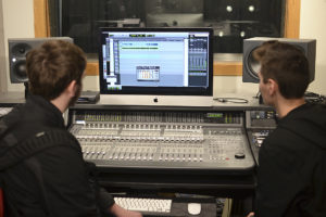 Experience college day students look at sound editing software