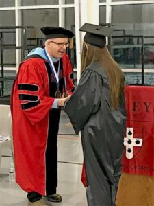 Minkler with graduate