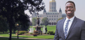 Quintin Phipps smiles in front of the CT state capital